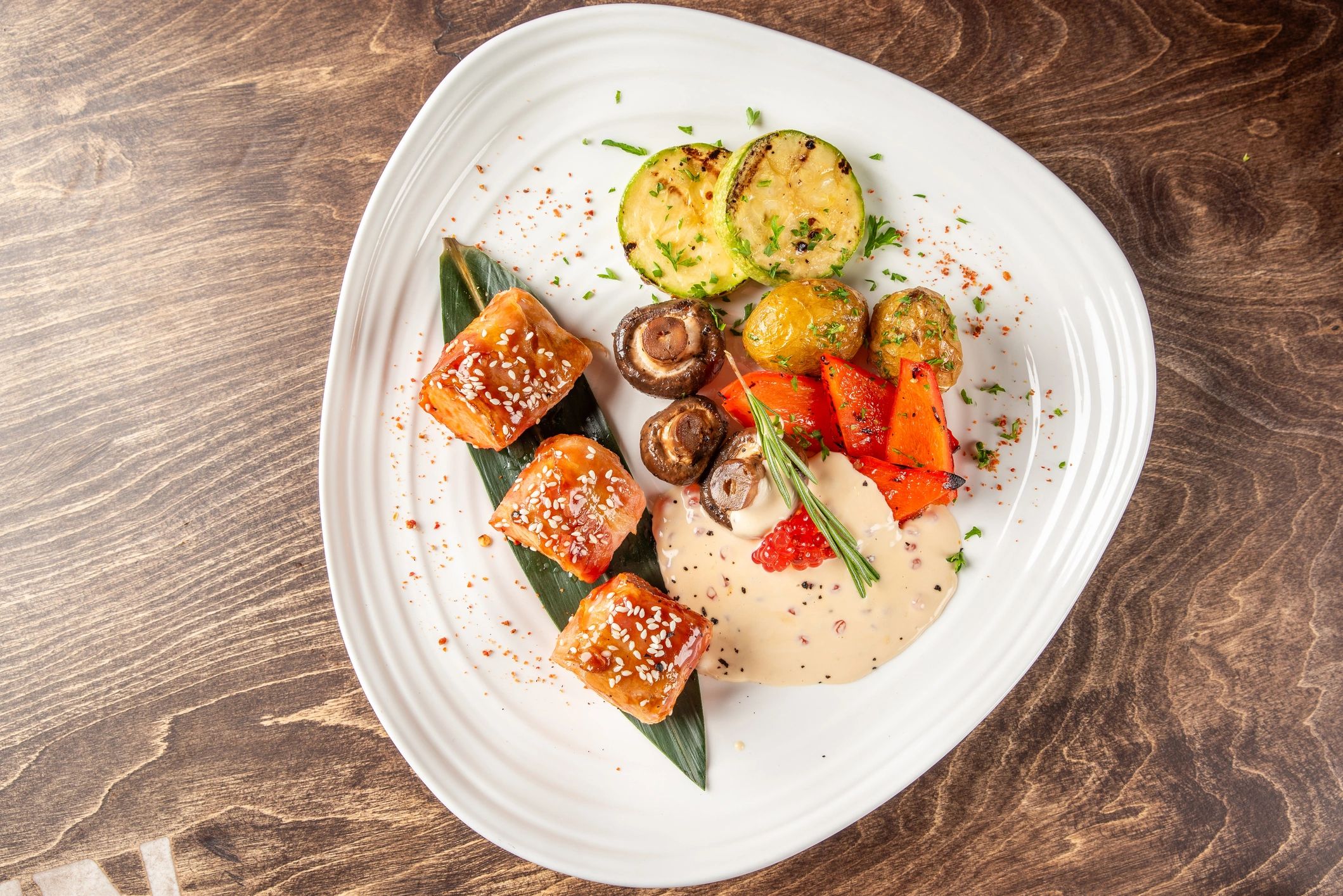 Close-up plated gourmet dish with vegetables